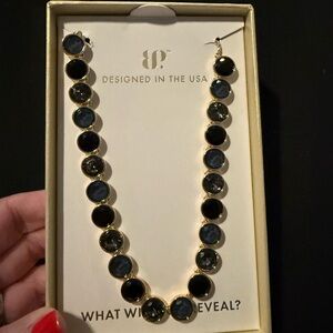 Elegant Gold and Black Necklace